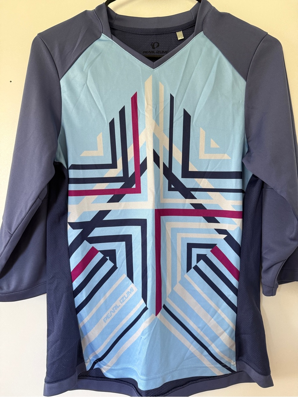 Pearl Izumi Light Blue and Navy Geometric Cycling Jersey with Magenta Accents